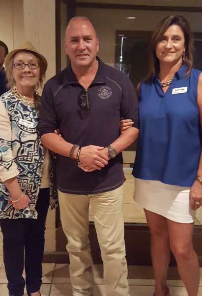 Title: August 2018 Meeting--Pat Soulier, ARW President; U.S. Congressman Clay Higgins; and Marsha Vining, ARW 1st Vice President
Club: Acadiana RW
Description: Pat Soulier, ARW President; U.S. Congressman Clay Higgins; and Marsha Vining, ARW 1st Vice President at the August 2018 meeting.