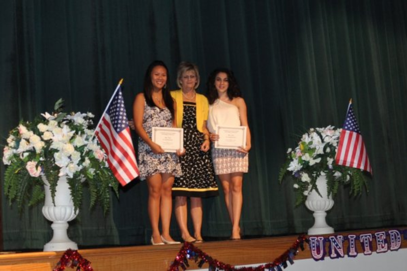 Title: Scholarship Presentation - 2011
Club: Saint Bernard RW
Description: Scholarship winners Duyen Hoang (left) and Melanie Benit (right) were honored by Scholarship Committee Chair Carol Ludwig on behalf of the St. Bernard Republican Women at our Flag Day Celebration and 40th Anniversary event.